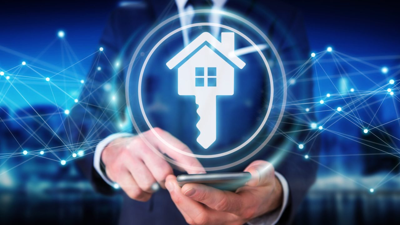 Businessman on blurred background using real estate digital interface 3D rendering